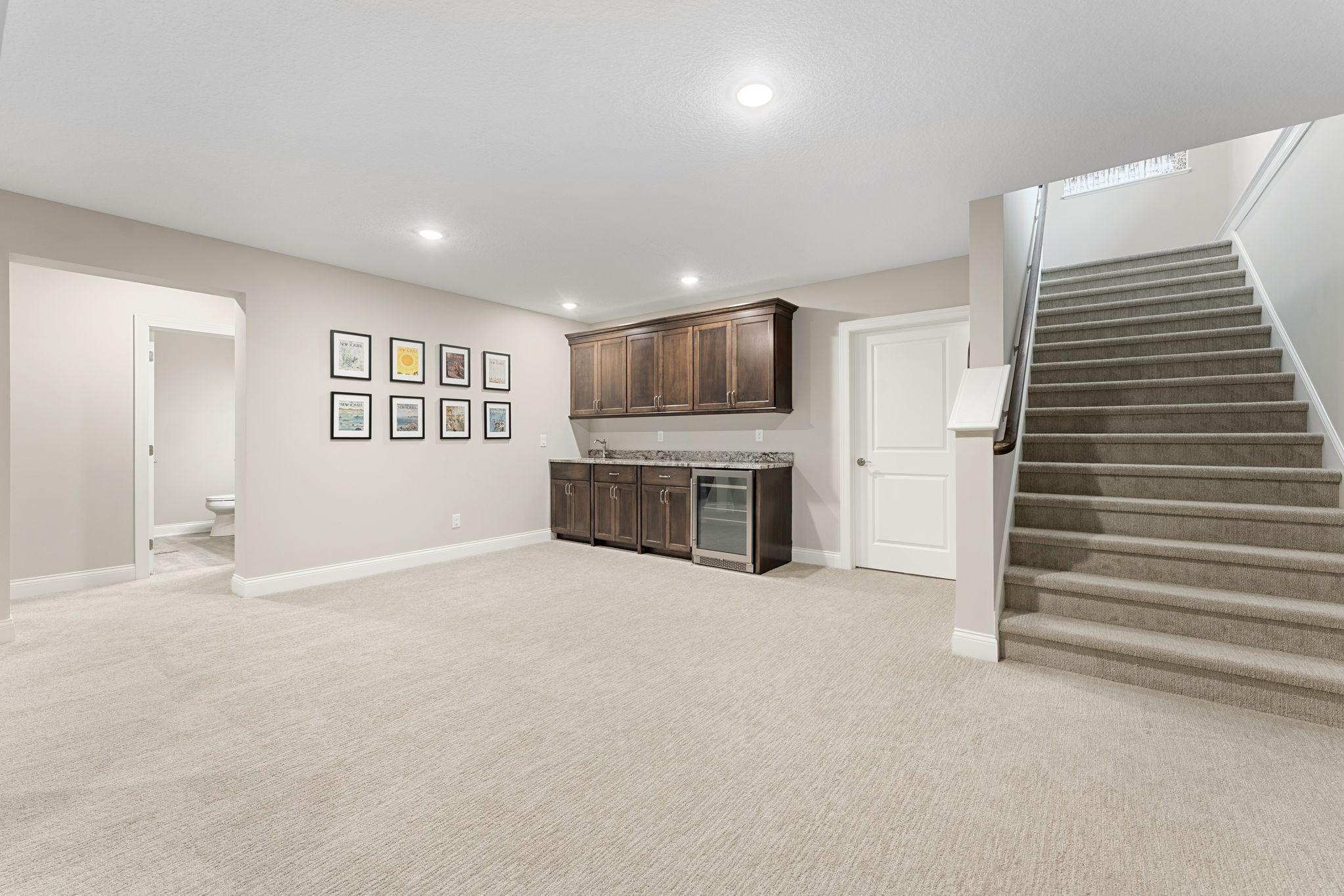 NOTE: there's plenty of space in front of the wet-bar for a game table/hobby table.