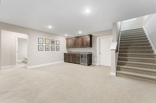 NOTE: there's plenty of space in front of the wet-bar for a game table/hobby table.