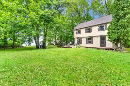 1.4 acre lot with a wonderful level yard for games or relaxing steps from the water