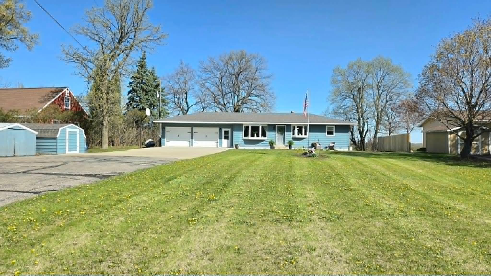 Large front yard offset from the road for added privacy