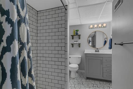 Tiled floors and shower surround