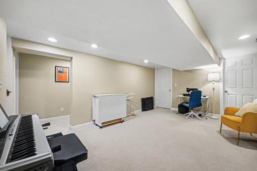 Lower level family room used for crafting now