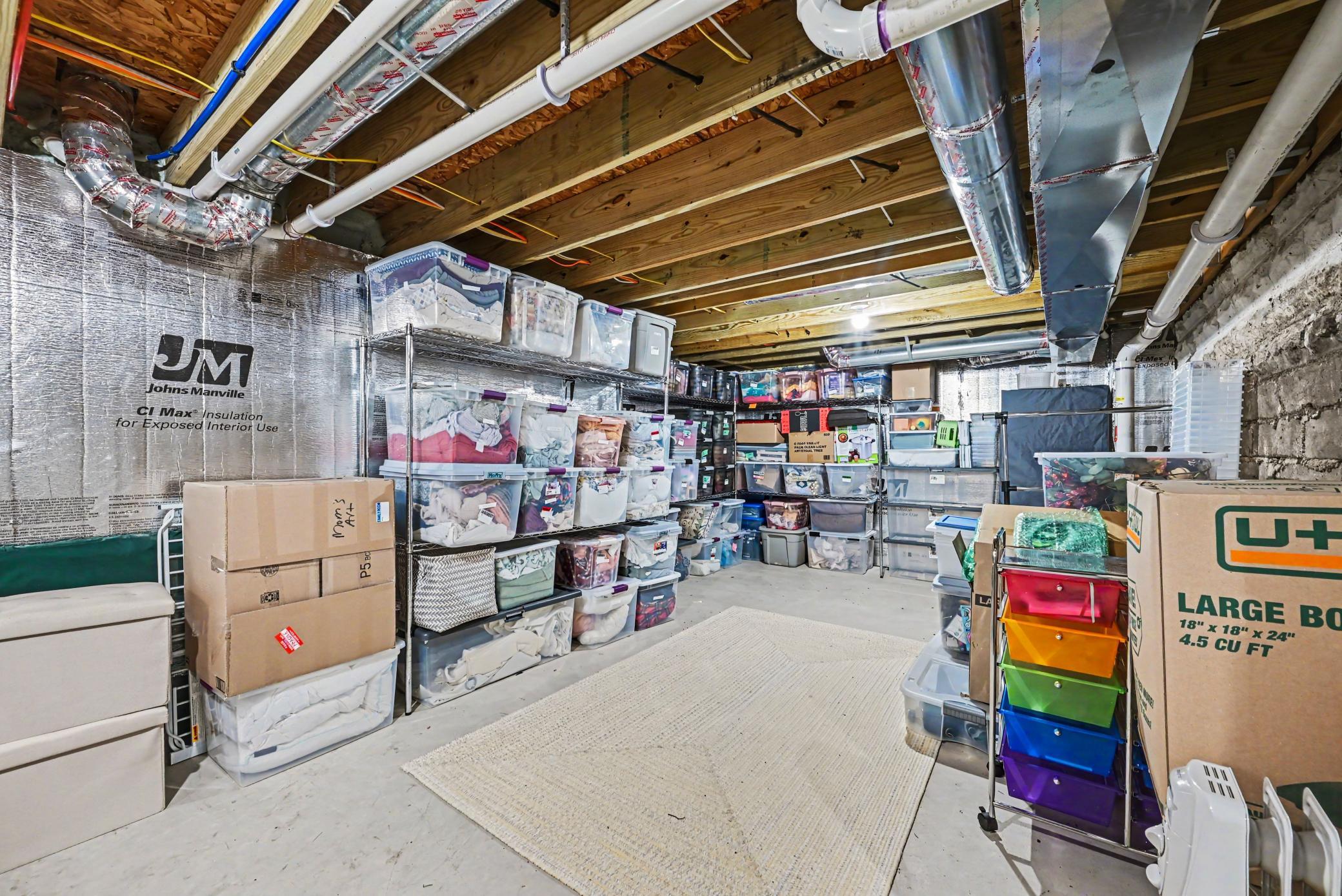 Storage room - lower level under the addition off the hose