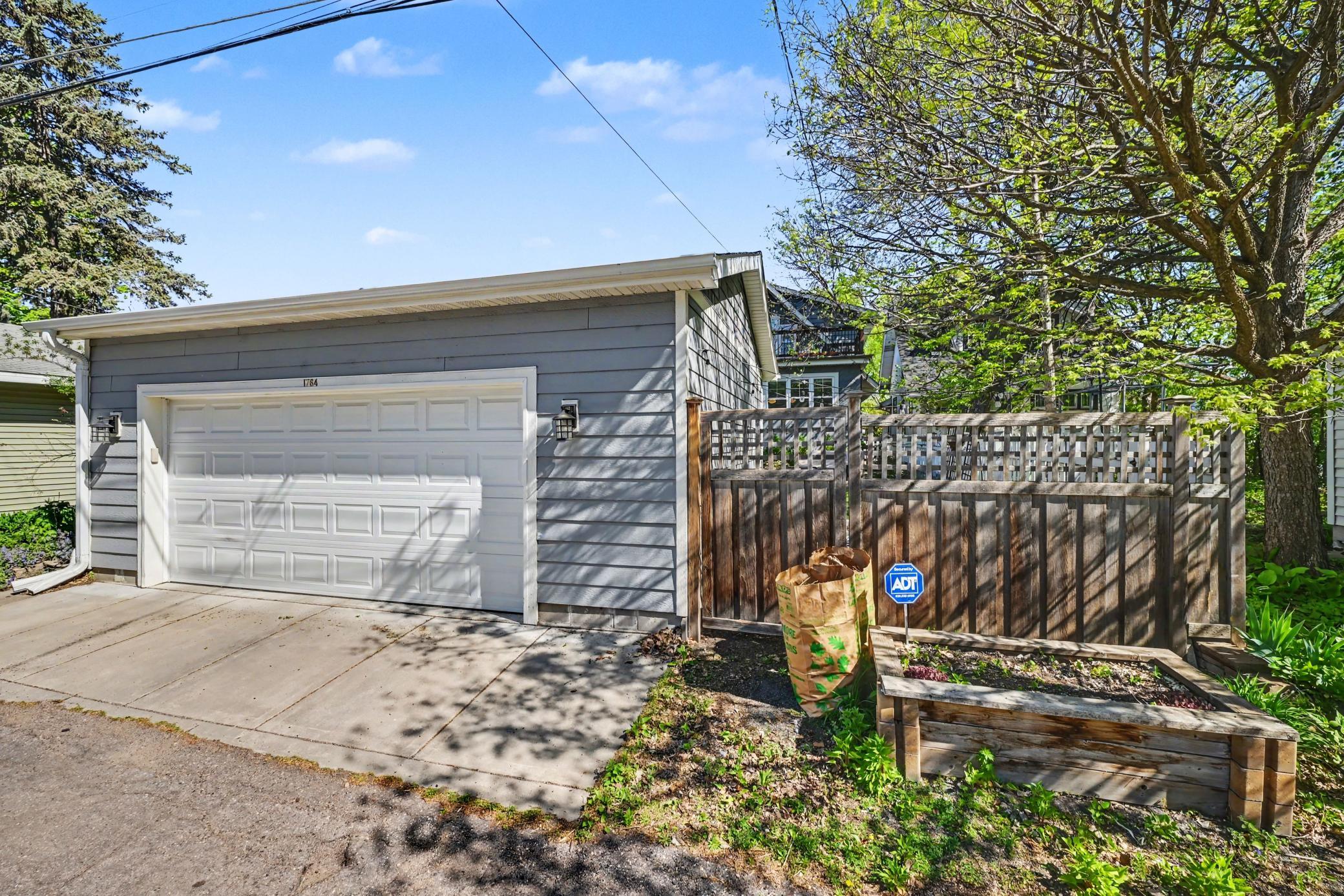 Two car garage with fenced yard