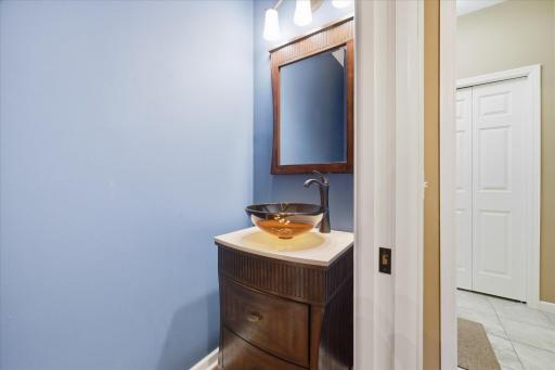 There is a lovely half bath just off the front entry and close to the back entry from garage