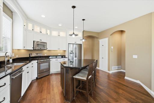 Beautiful gleaming wood floors thru the kitchen, dining room and entry