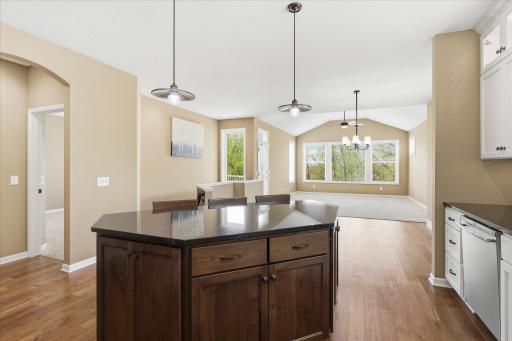 Another view showing proximity of the primary main floor bedroom suite from the kitchen area