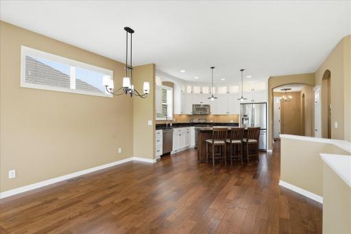 Looking back from the great room to the kitchen and also the entry foyer