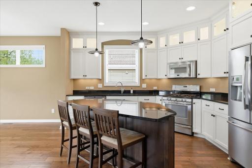 Beautiful enameled cabinets, granite countertops