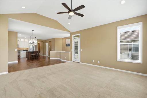 Great room showing another angle and the door to the deck