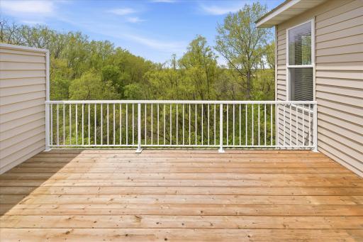 One of the most unique features of this townhome is it backs up to the river valley with lots of privacy out back, and below there is a walking trail thru the woods