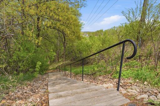 stairs down the the walking path that goes thru part of the nature preserve out back
