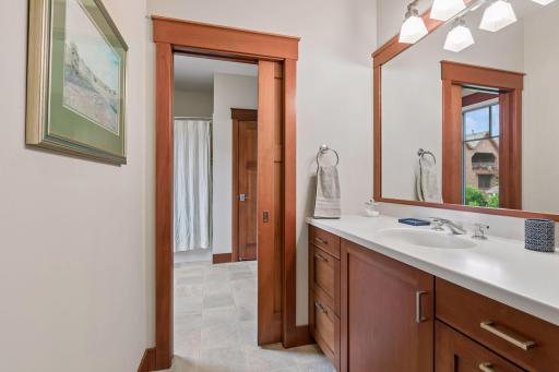 Bedroom 2 offers direct access to a Jack-and-Jill full bath with private vanity area.