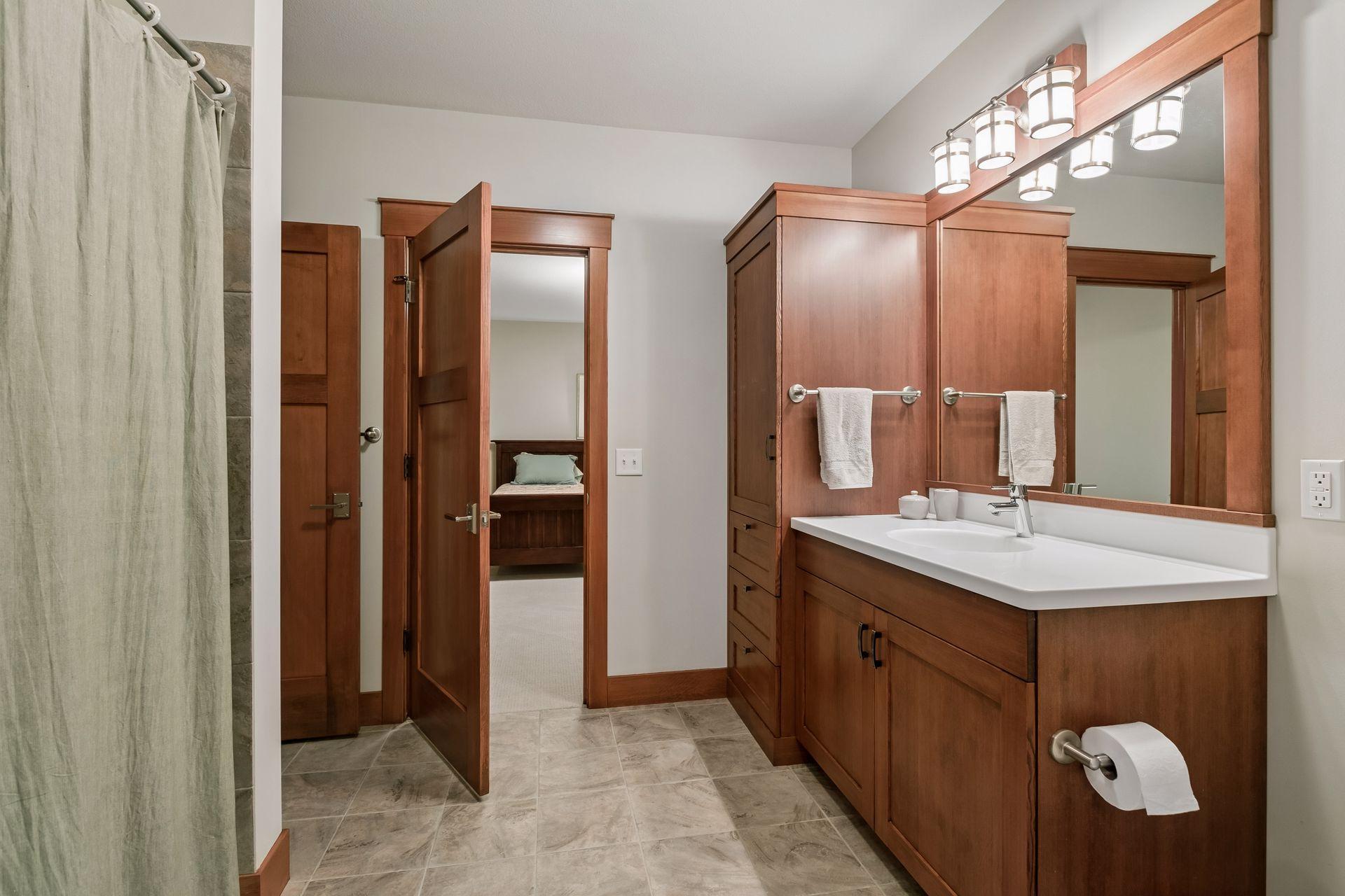 Another view of lower level full bath.