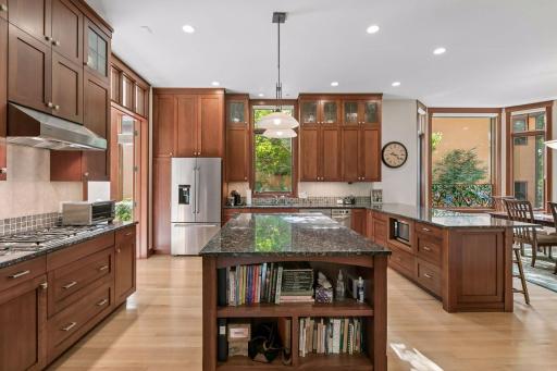 Custom cabinetry and stainless steel appliances.
