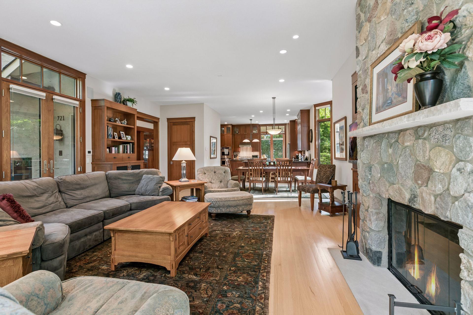 Family room featuring a wood burning fireplace.