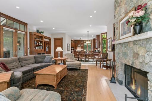Family room featuring a wood burning fireplace.