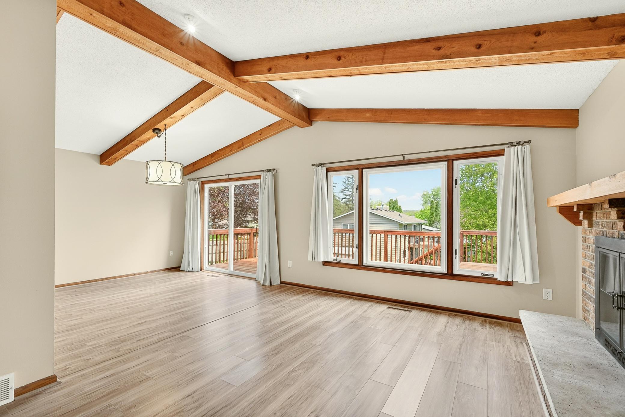 Living & Dining room with access to the back deck