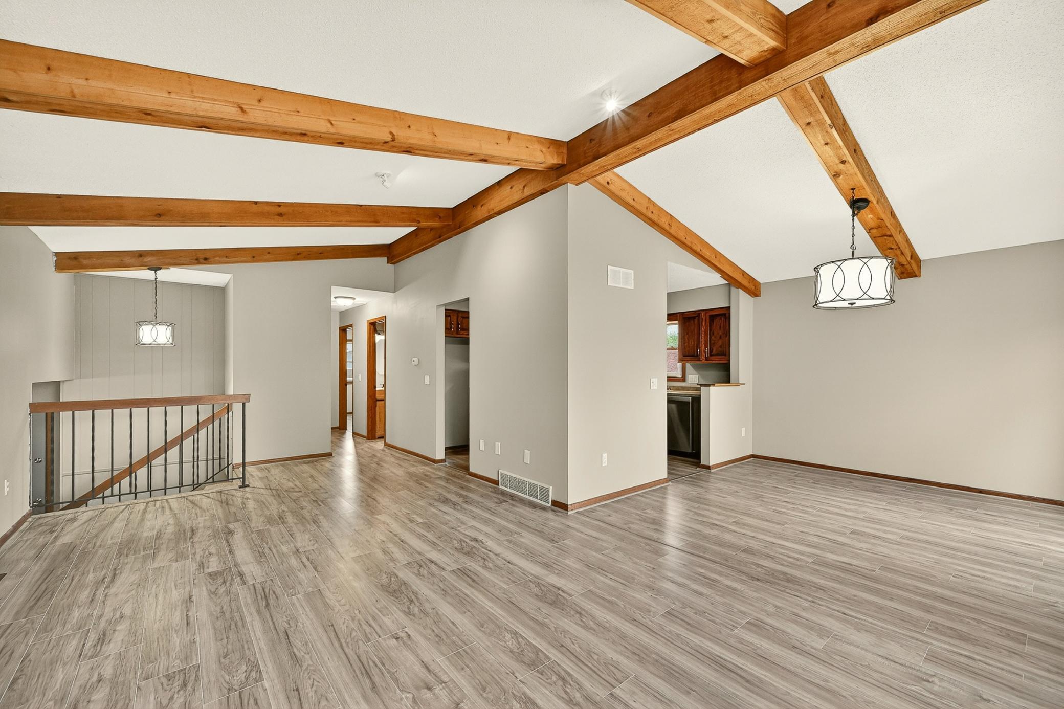 Living & Dining Room with beautiful wood beams