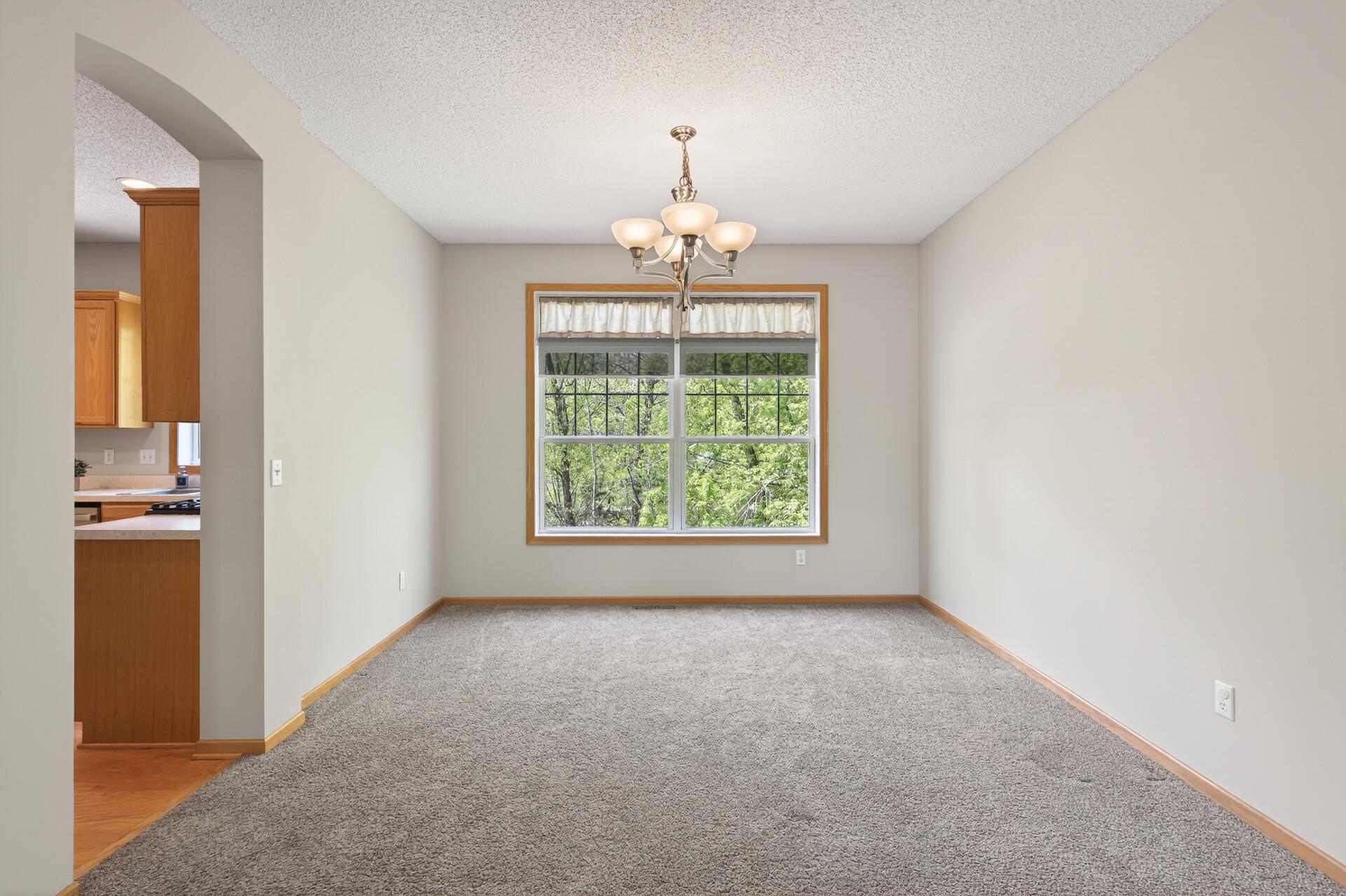 Generous formal dining area perfect for entertaining and everyday gatherings.
