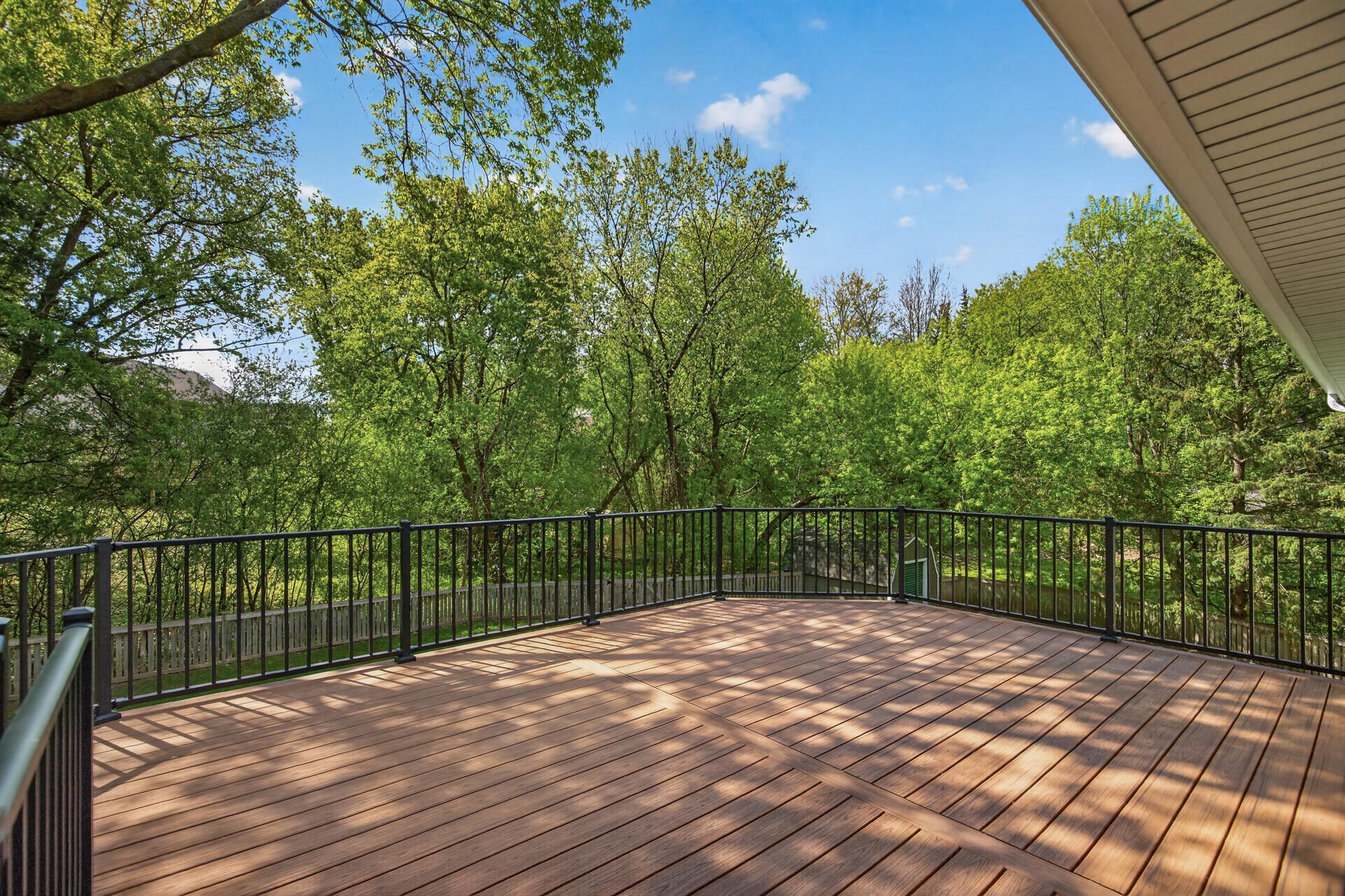 Deck Overlooking Private Treed Backyard