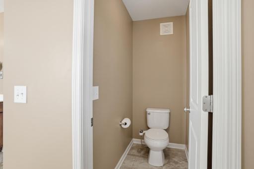 Private bathroom tucked away from the rest of the primary bath.