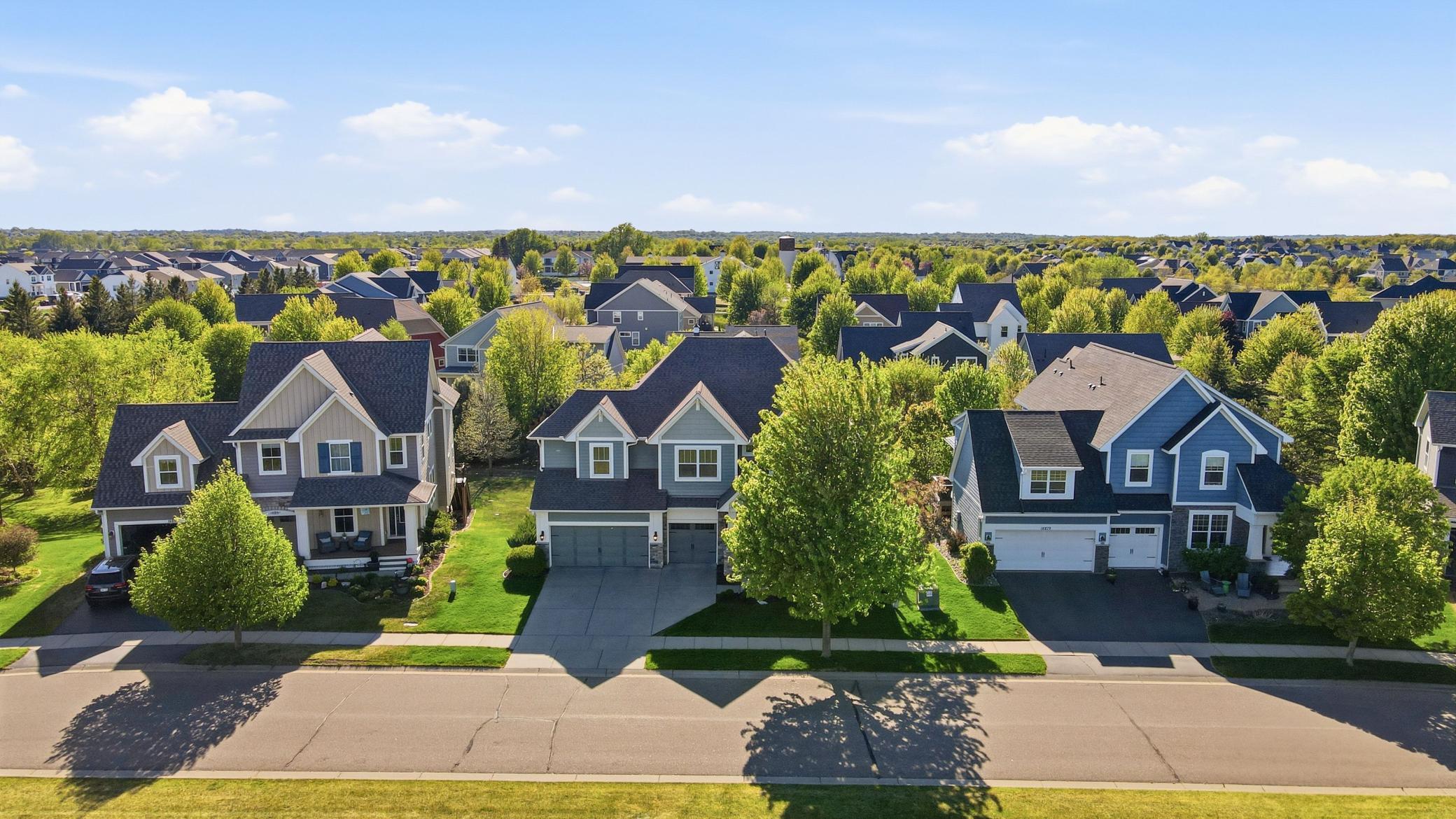 Situated on a quiet one-way-in, one-way-out street centered around shared green space.