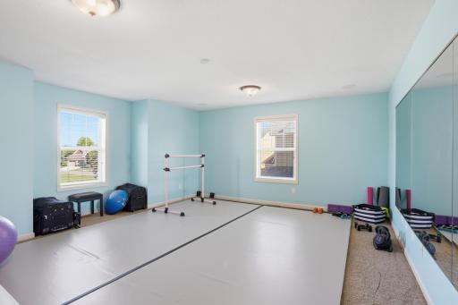 Currently set up as a dance/workout space, but easily works as a bedroom, playroom, or bonus room.
