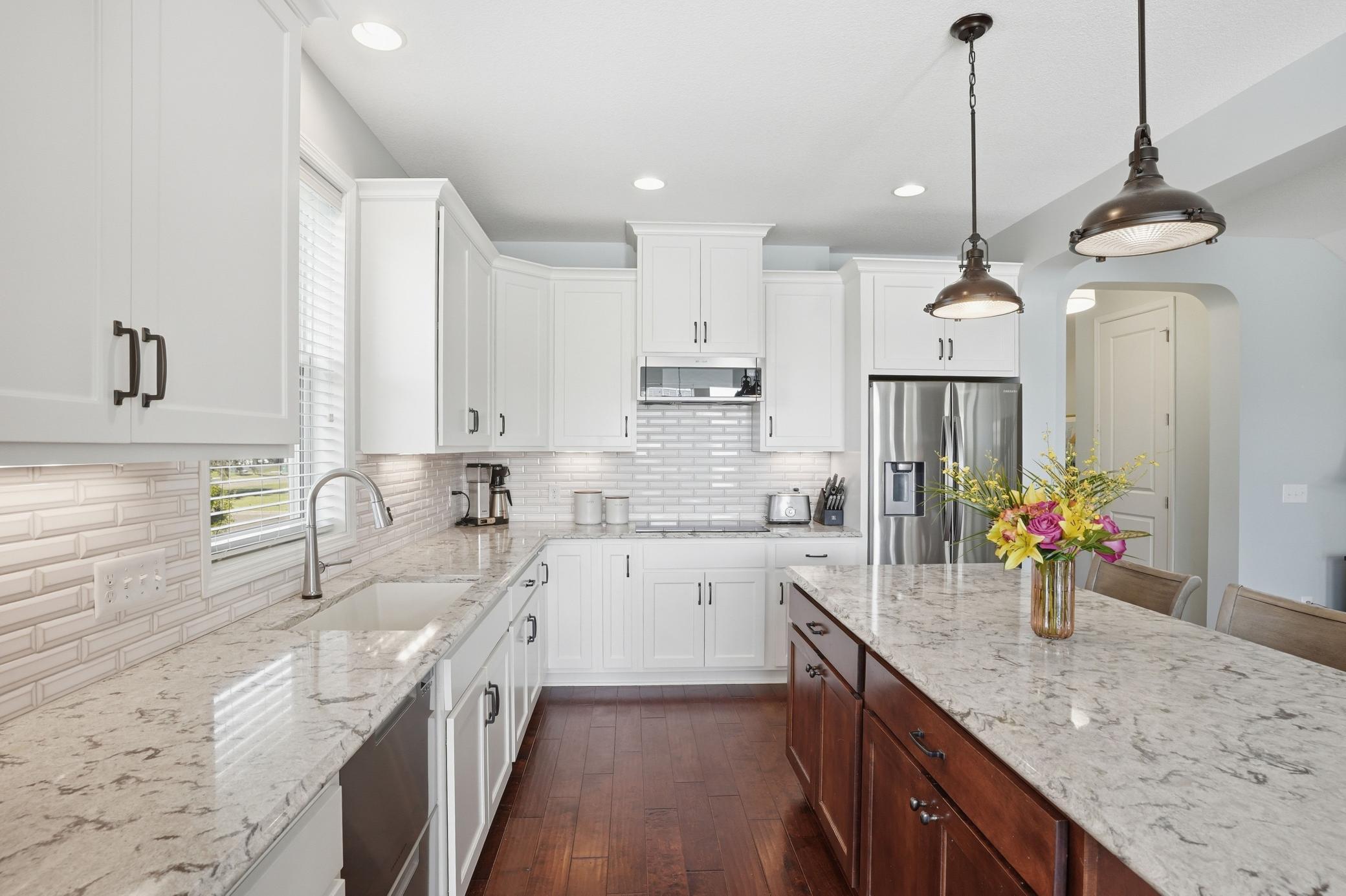 Thoughtfully designed kitchen with abundant cabinet and counter space.
