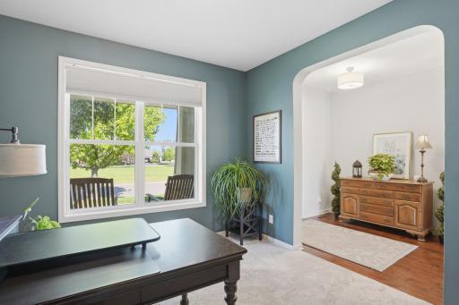 Tucked near the front of the home, this space works beautifully as an office, reading room, or second sitting area.