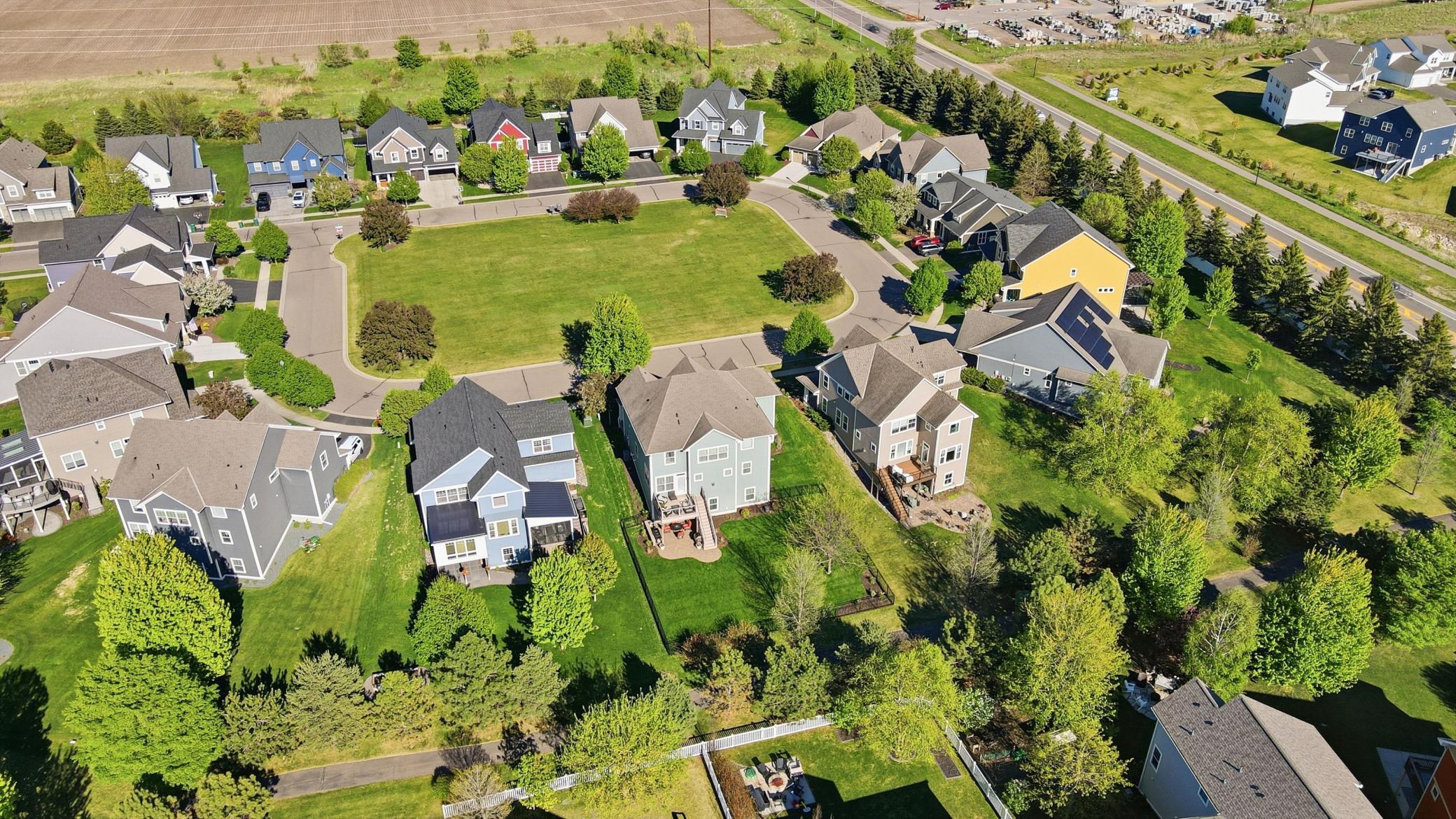 Private backyard with direct access to walking paths.