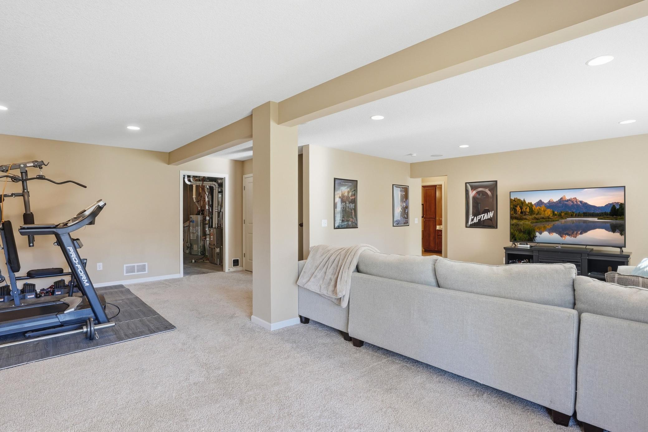 The lower level makes an ideal guest retreat with its own living space, bedroom, and bathroom.