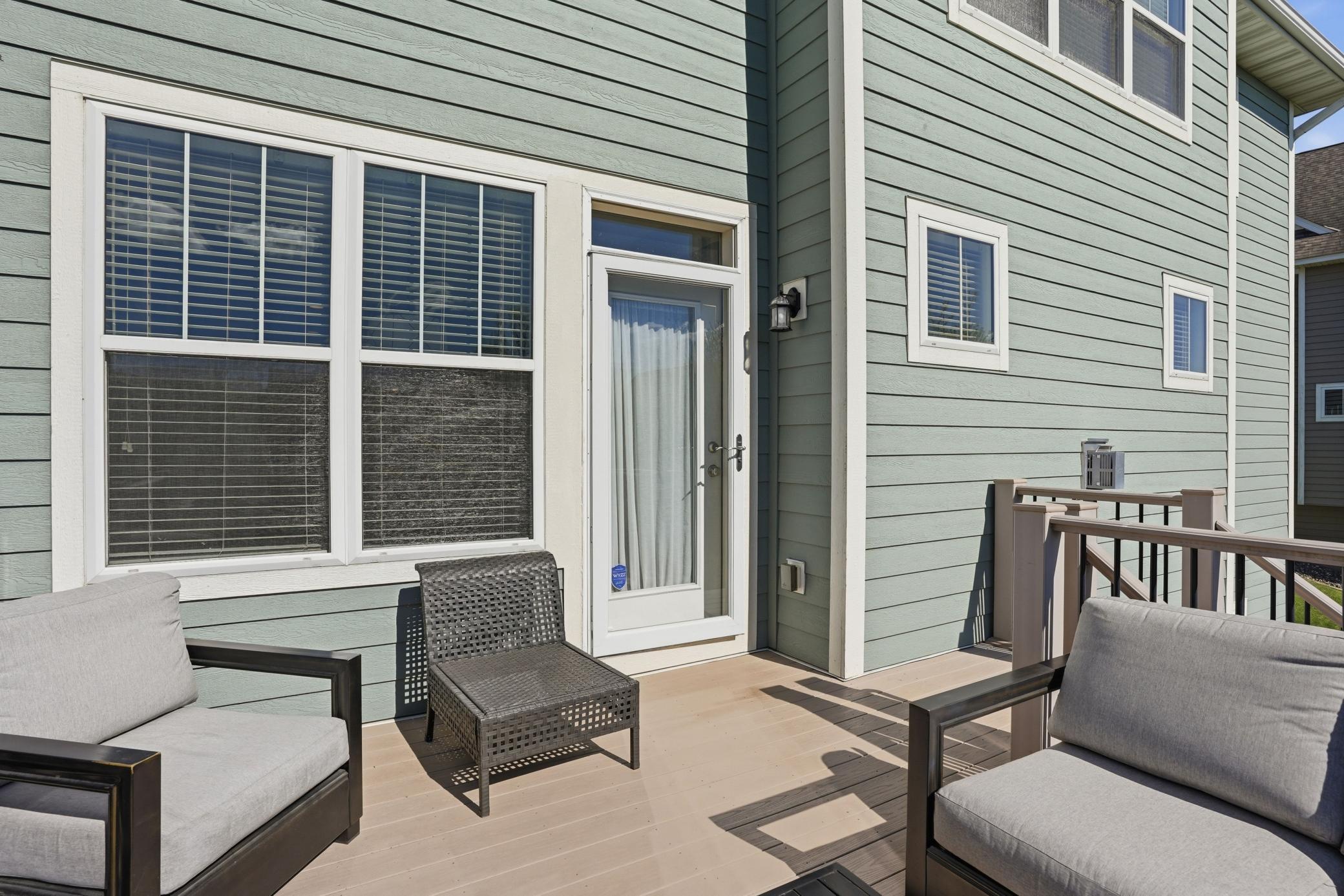 Maintenance-free composite deck with easy access to the backyard and beautiful outdoor living space.