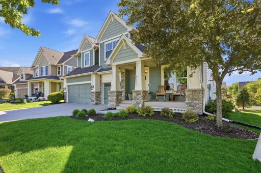 Charming front porch with room to sit back and unwind.