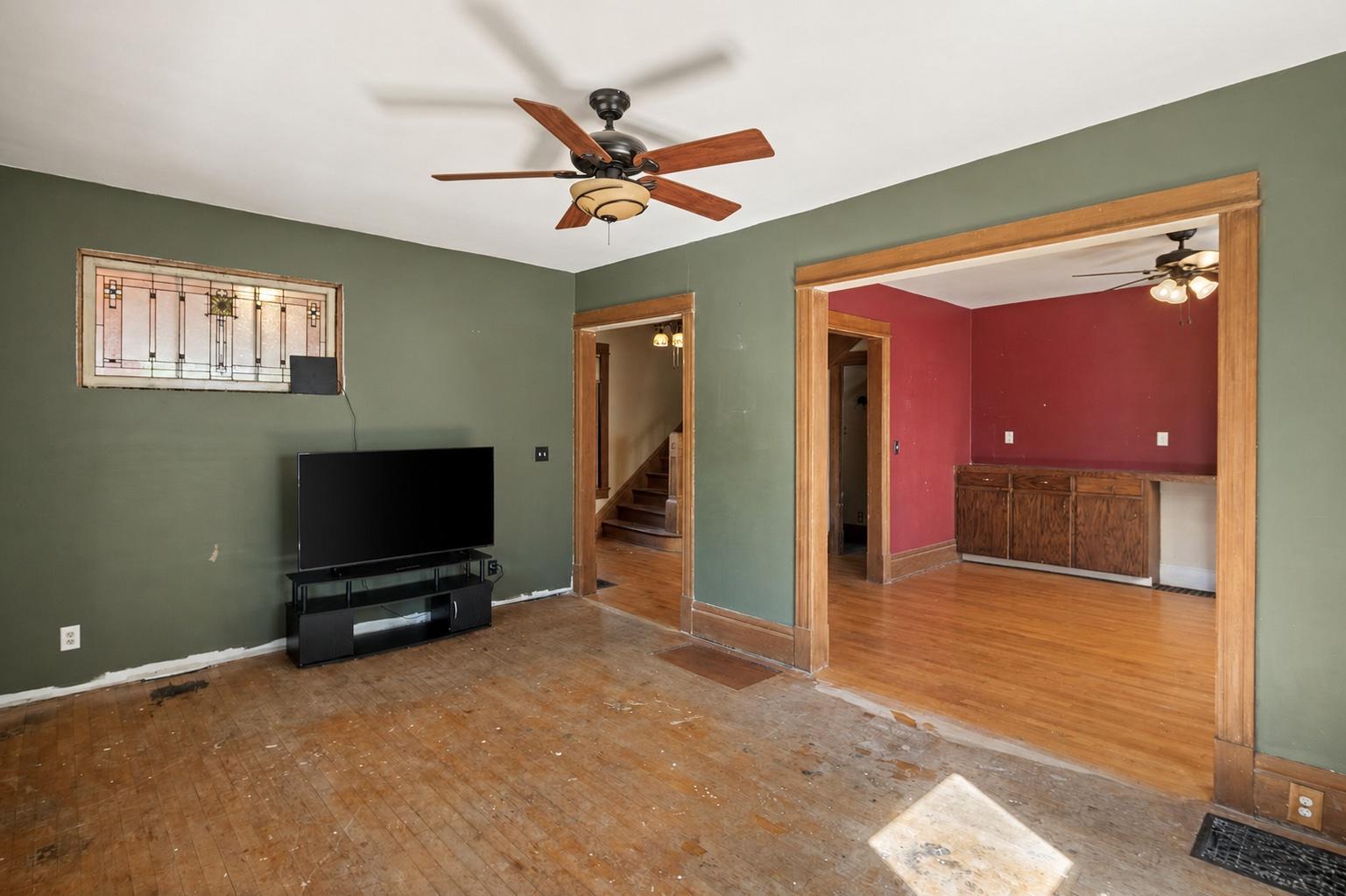 Main floor living room with pass through to the dining area