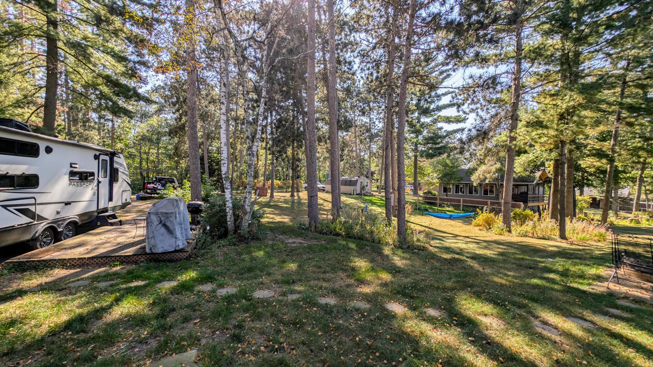 View looking back from the lake towards road and west half of property.