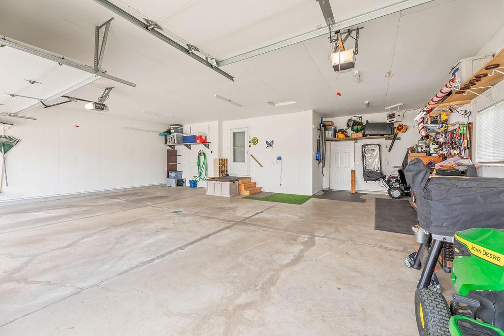 Spacious 3-car Garage with direct access to backyard