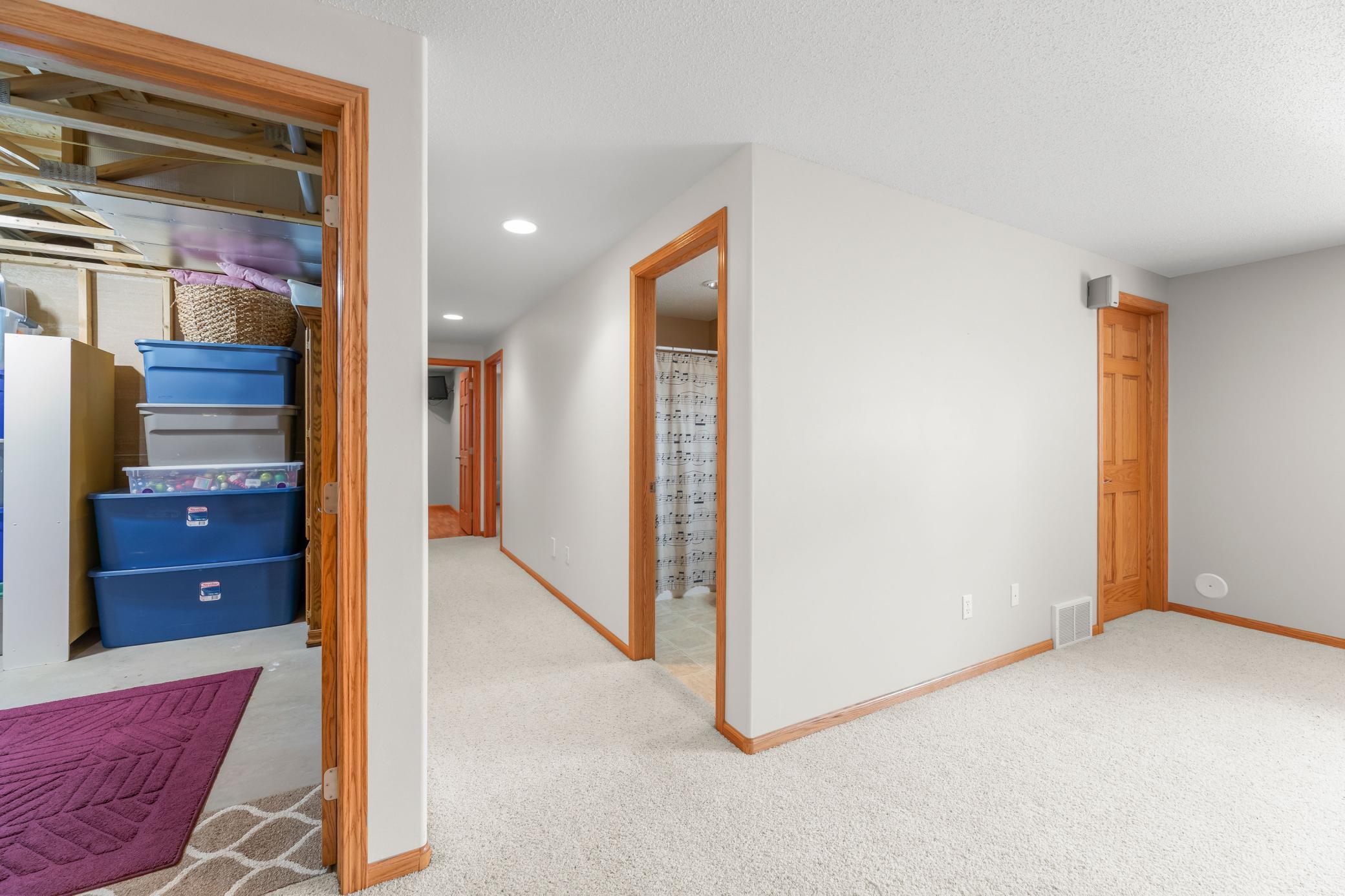 Hallway to basement bedroomss