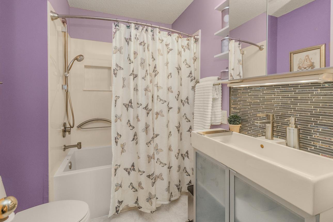 Luxurious upper level full bath offers heated tile floors!
