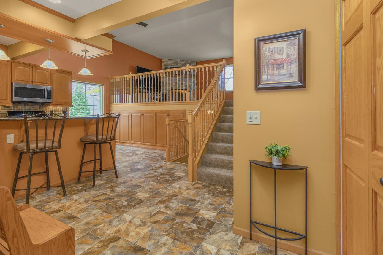 Spacious foyer with convenient access to 3-car garage.