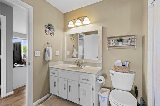 Full bathroom opens from the primary bedroom and the hallway