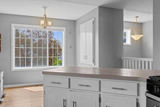 Plenty of cabinet space and extra seating at the counter or set up a small table by the window