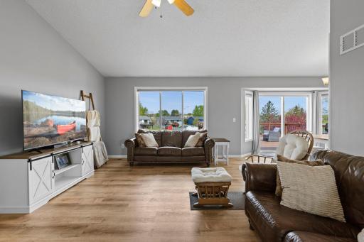 Up the stairs you'll enter the spacious and bright living room