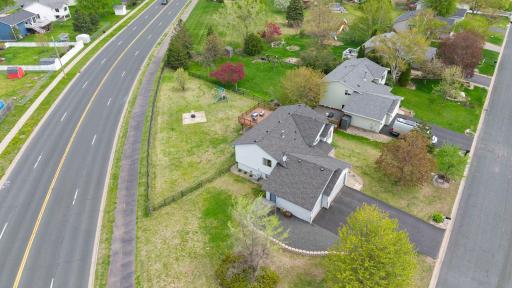 Enjoy the spacious corner lot with a fenced back yard