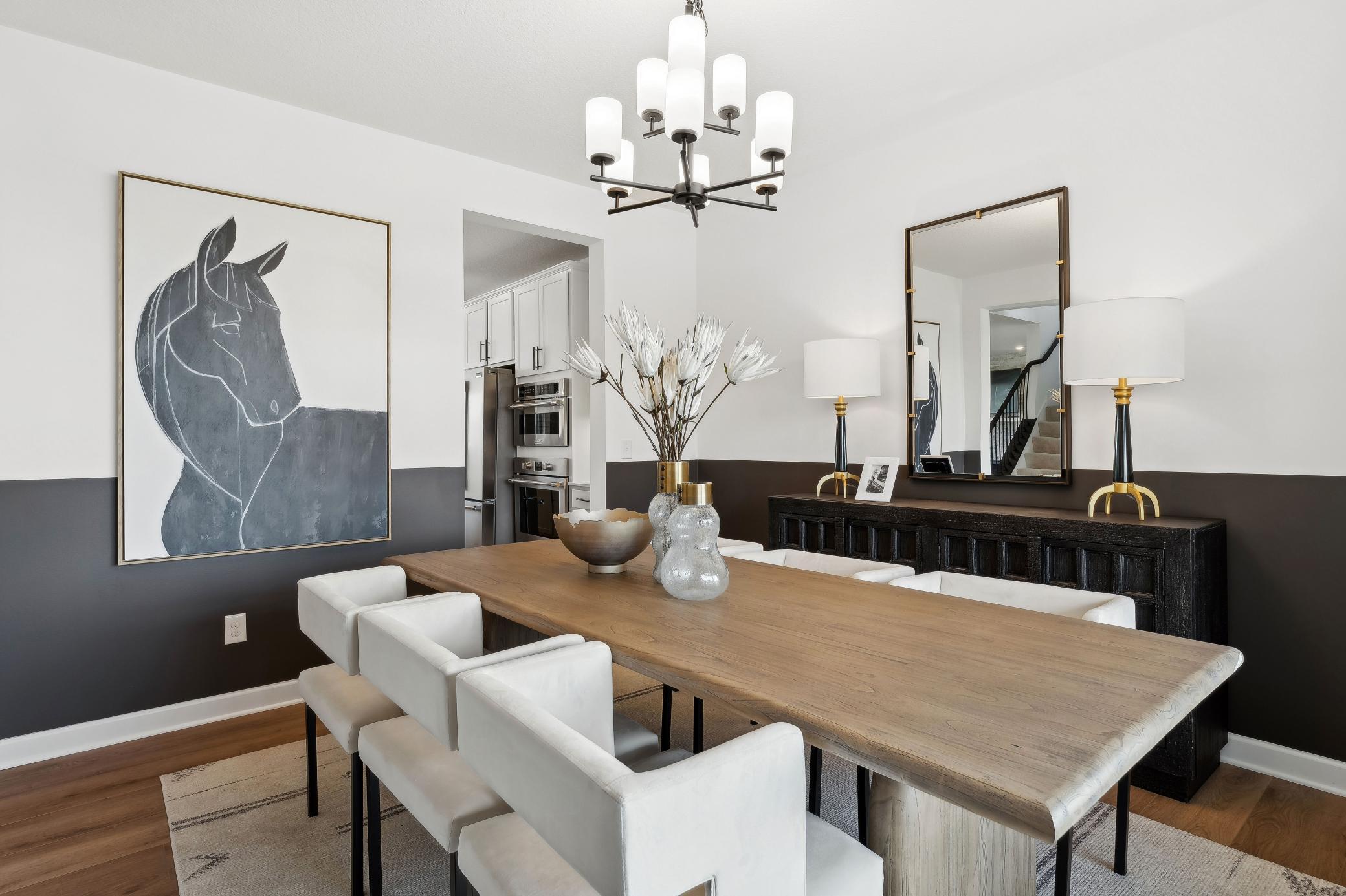 (Photo of a decorated model, actual homes finishes will vary) Have a meal with your friends and family in your formal dining area!