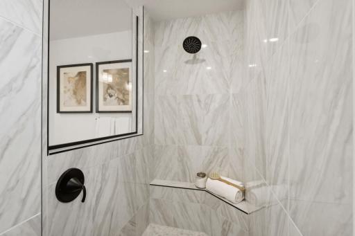 (Photo of a decorated model, actual homes finishes will vary) The serenity shower.