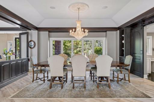 Formal dining room with views of the front yard