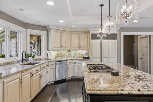 Granite countertops, kitchen window, copper sink, and high end appliances