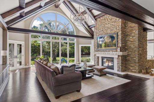Second living space with another gas fireplace and slate surround fireplace