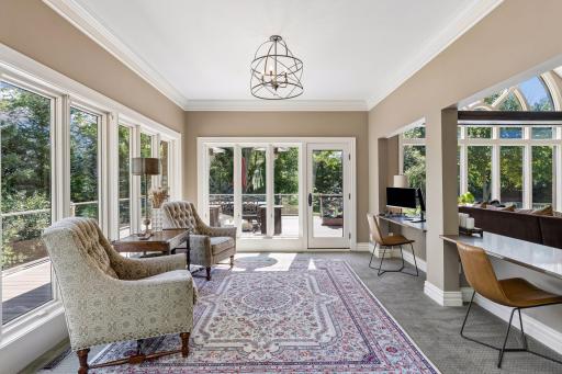 Cozy family room with access to the maintenance free deck and outdoor spaces